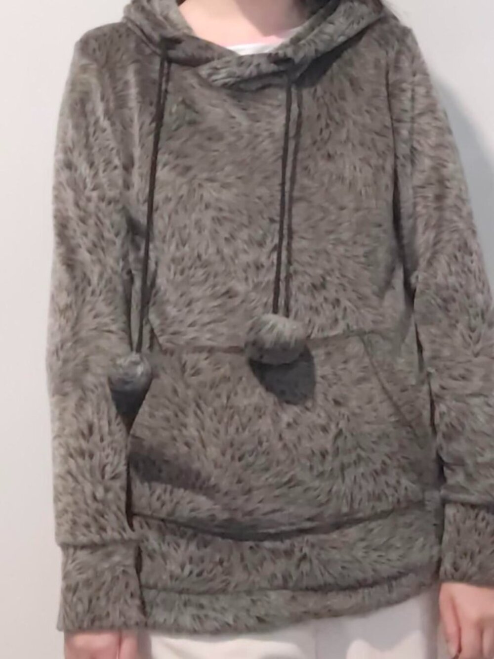 Grey fur hoodie with pom poms